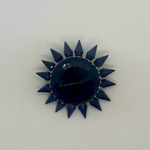 Vintage black jeweled brooch.